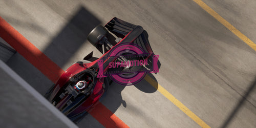 Overhead shot modern generic sports racing car driving out from pitlane garage