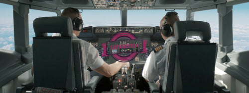 Commercial aircraft pilots controlling the plane during flight at high altitude