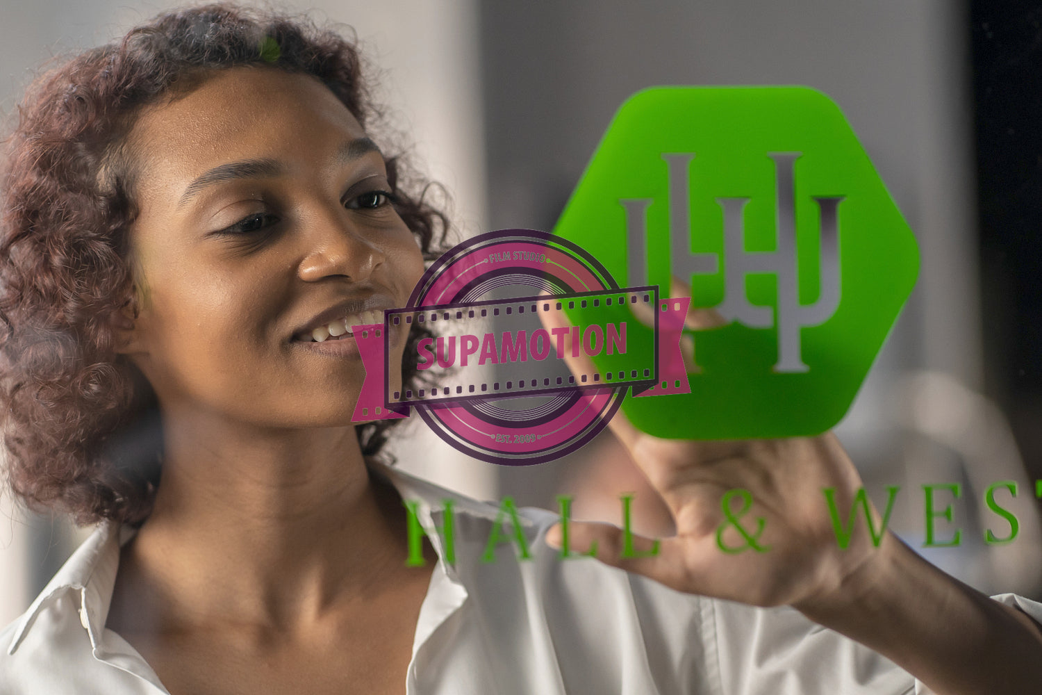 Portrait of African American entrepreneur applying sticker with her company name