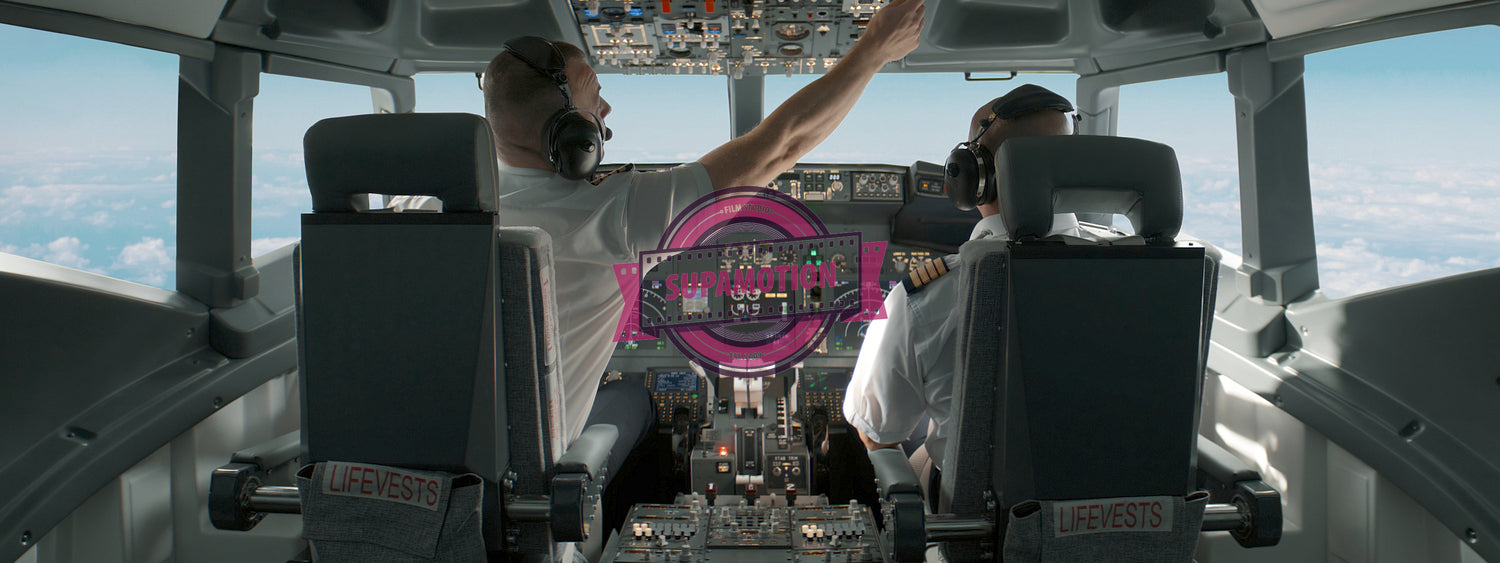 Commercial aircraft pilots controlling the plane during flight at high altitude