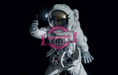 Caucasian female astronaut using her mobile phone during spacewalk